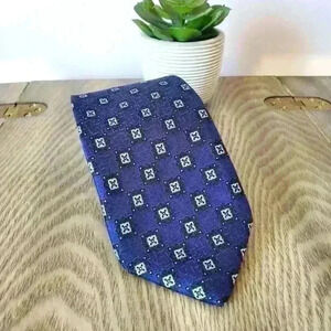 Robert Talbott classic blue tie.  100% hand sewn silk.